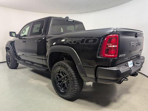 Diamond Black Crystal Pearlcoat 2026 RAM 1500 RHO Crew Cab 4x4 5'7' Box