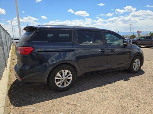 Formal Deep Blue 2015 Kia Sedona LX