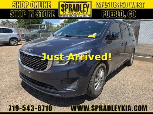 Formal Deep Blue 2015 Kia Sedona LX