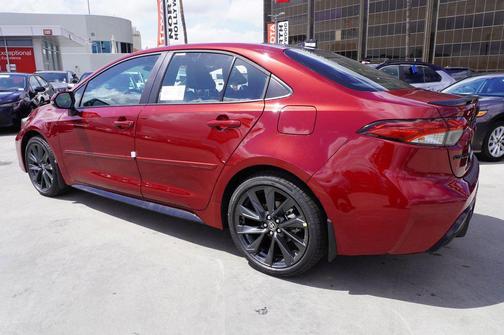 Ruby Flare Pearl/Midnight Black Metallic 2026 Toyota Corolla XSE