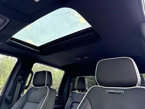 Volcanic Red Tintcoat 2026 GMC Sierra 2500 AT4X