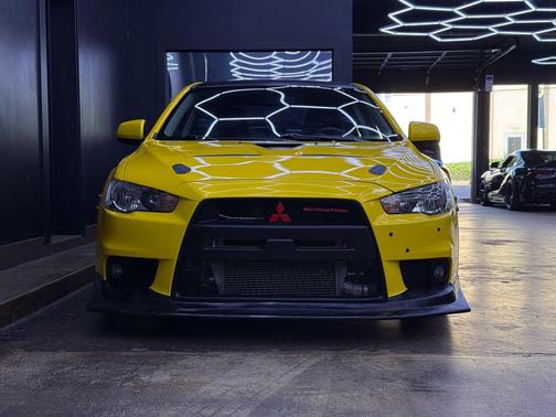 Yellow 2008 Mitsubishi Lancer Evolution GSR