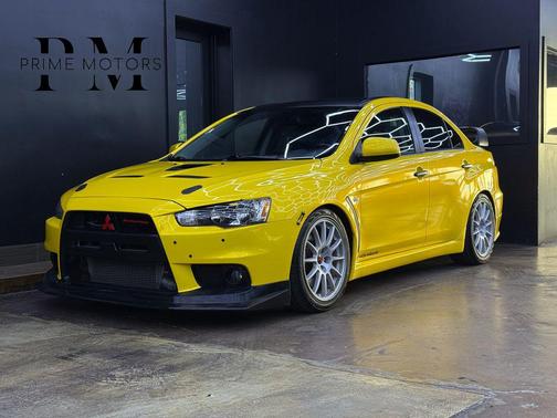 Yellow 2008 Mitsubishi Lancer Evolution GSR