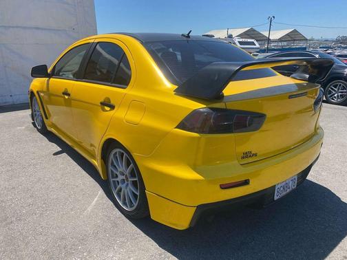Yellow 2008 Mitsubishi Lancer Evolution GSR