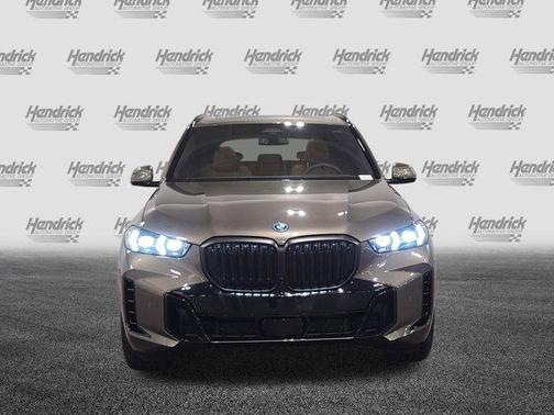 Manhattan Green Metallic 2026 BMW X5 PHEV xDrive50e