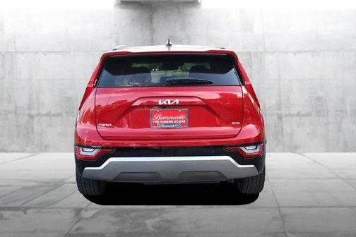 Red 2024 Kia Niro SX Touring