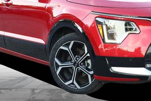 Red 2024 Kia Niro SX Touring