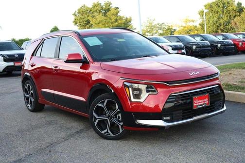 Red 2024 Kia Niro SX Touring