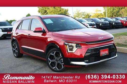Red 2024 Kia Niro SX Touring