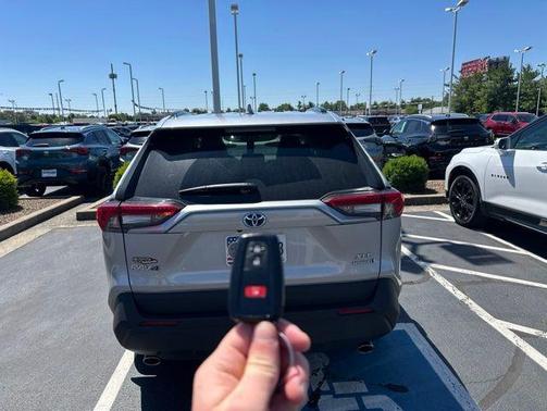 Silver Sky Metallic 2024 Toyota RAV4 Hybrid XLE