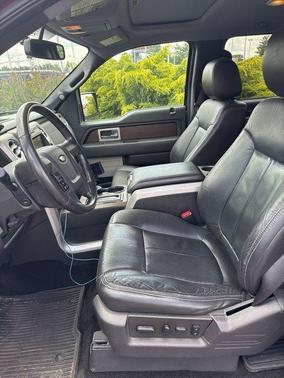 Red 2013 Ford F-150 Lariat