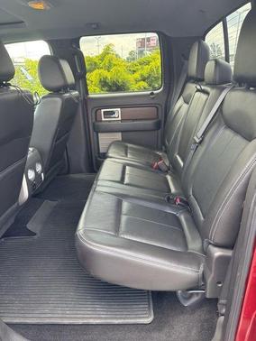 Red 2013 Ford F-150 Lariat