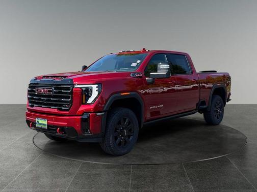 Volcanic Red Tintcoat 2026 GMC Sierra 3500 AT4