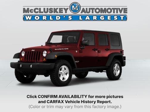 Red Rock Crystal Pearl 2010 Jeep Wrangler Unlimited Sahara