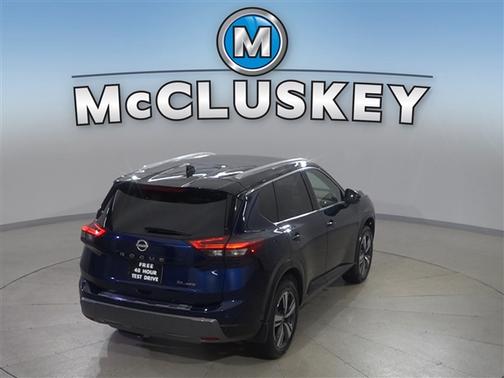 Deep Ocean Blue Pearl/Super Black 2024 Nissan Rogue SL
