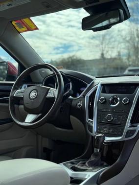 Crystal Red Tintcoat 2012 Cadillac SRX Luxury Collection