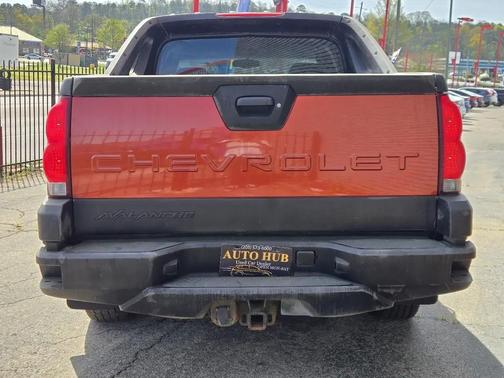 Orange 2002 Chevrolet Avalanche 1500