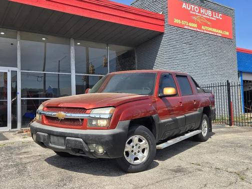 Orange 2002 Chevrolet Avalanche 1500