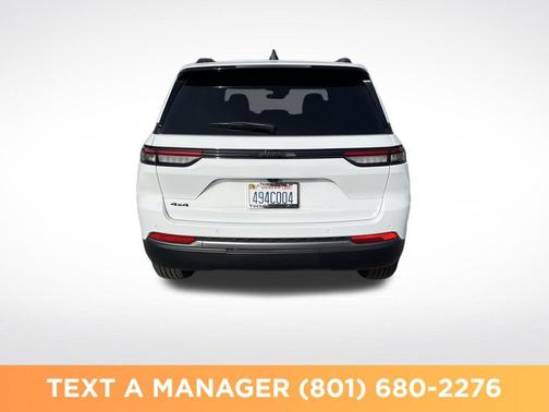 Bright White Clearcoat 2026 Jeep Grand Cherokee Altitude