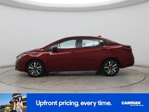Red 2025 Nissan Versa SV