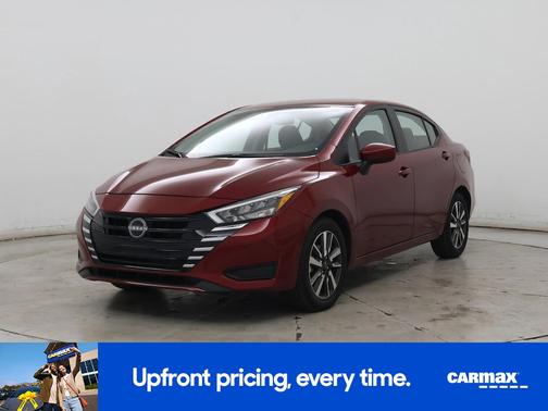 Red 2025 Nissan Versa SV