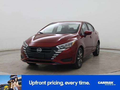 Red 2025 Nissan Versa SV