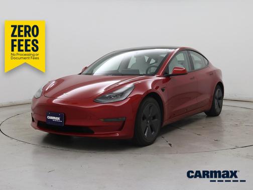 Red 2023 Tesla Model 3