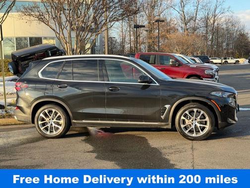 Black Sapphire Metallic 2025 BMW X5 PHEV xDrive50e