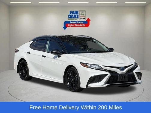 Midnight Black Metallic 2024 Toyota Camry Hybrid XSE