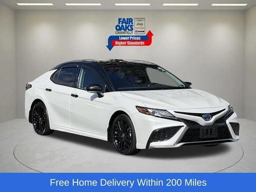 Midnight Black Metallic 2024 Toyota Camry Hybrid XSE