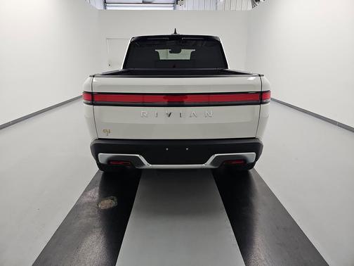 Glacier White 2023 Rivian R1T Adventure Quad Motor Large Pack