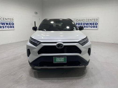 Wind Chill Pearl/Midnight Black Metallic 2025 Toyota RAV4 Hybrid SE