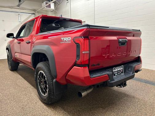 Red 2025 Toyota Tacoma Hybrid TRD