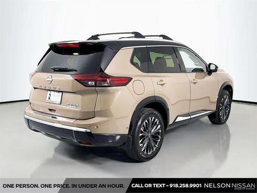 Baja Storm Metallic/Super Black 2025 Nissan Rogue Platinum