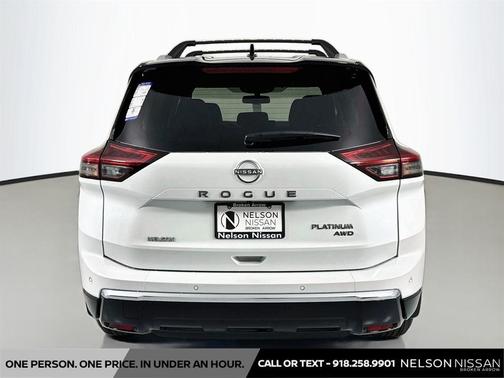 Everest White Pearl/Super Black 2026 Nissan Rogue Platinum
