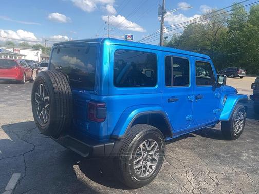 Blue 2025 Jeep Wrangler 4-Door Sahara 4x4