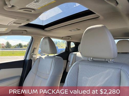White 2021 Nissan Rogue Sport SL