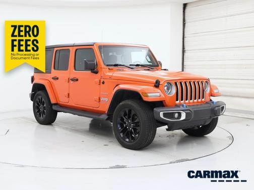 Orange 2023 Jeep Wrangler 4xe Unlimited Sahara