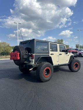 Sahara Tan Clearcoat 2011 Jeep Wrangler Unlimited Rubicon