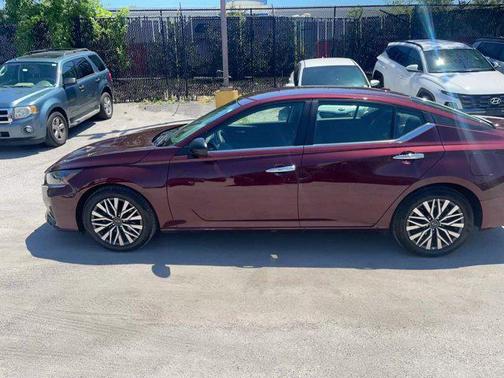 Garnet Pearl Metallic 2025 Nissan Altima SV FWD