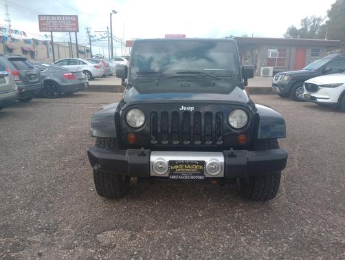 Black Clearcoat 2012 Jeep Wrangler Unlimited Sahara
