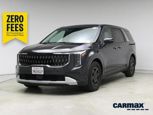 Gray 2025 Kia Carnival LXS