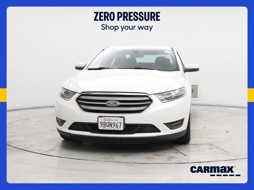 White 2016 Ford Taurus SEL