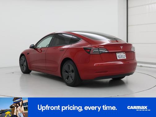 Red 2023 Tesla Model 3