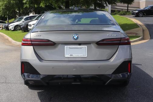 Oxide Grey Metallic 2026 BMW 550e xDrive