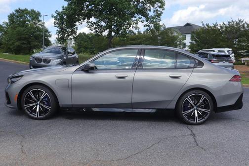Oxide Grey Metallic 2026 BMW 550e xDrive