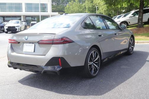 Oxide Grey Metallic 2026 BMW 550e xDrive