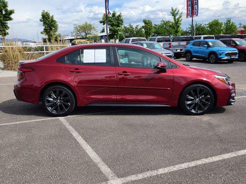 Ruby Flare Pearl/Midnight Black Metallic 2024 Toyota Corolla XSE