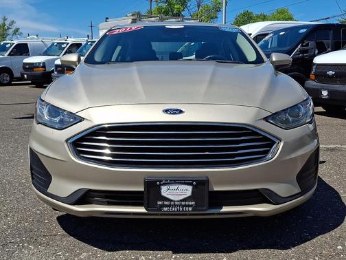 White Gold Metallic 2019 Ford Fusion Hybrid SE