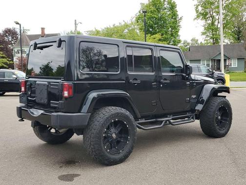 Black Clearcoat 2016 Jeep Wrangler Unlimited Sahara